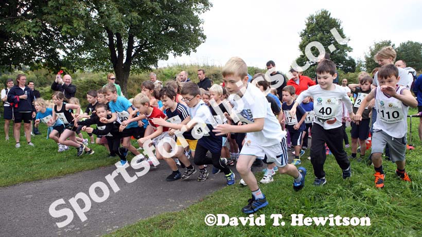 Look North weatherman Paul Mooney starts the youngsters race at the Prudhoe Miners Race.